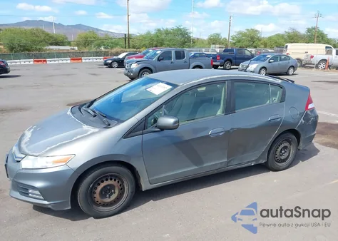 2014 Honda Insight from USA, damaged, VIN JHMZE2H37ES001644